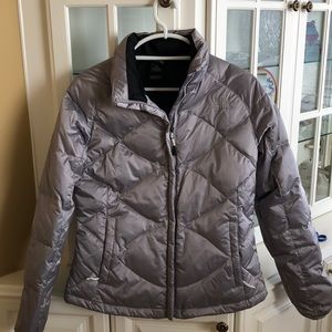Women’s North Face puffer jacket size M.